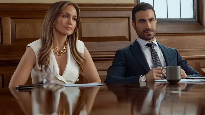 (L-R) Jennifer Lopez as Jackie Cruz and Brett Goldstein as Daniel Blanchflower in Office Romance (L-R) Jennifer Lopez as Jackie Cruz and Brett Goldstein as Daniel Blanchflower in Office Romance