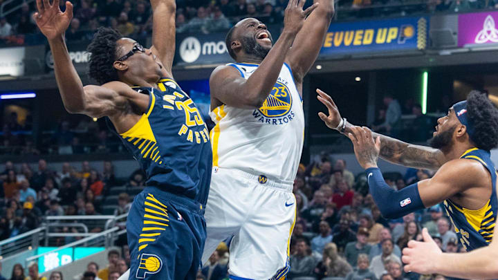 Dec 14, 2022; Indianapolis, Indiana, USA; Golden State Warriors forward Draymond Green (23) shoots against the Indiana Pacers.