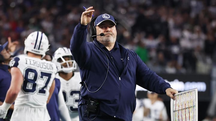 Dec 10, 2023; Arlington, Texas, USA; Dallas Cowboys head coach Mike McCarthy throws a challenge flag