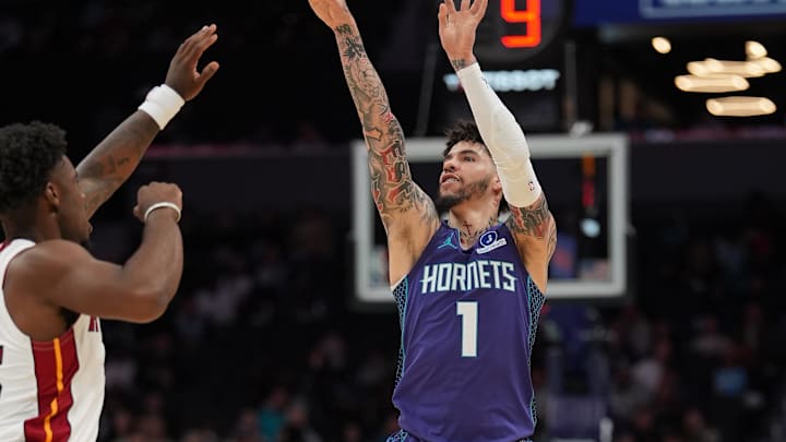 Mar 17, 2026; Charlotte, North Carolina, USA; Charlotte Hornets guard LaMelo Ball (1) shoots a three point basket against the Miami Heat during the first quarter at Spectrum Center. Mandatory Credit: Jim Dedmon-Imagn Images