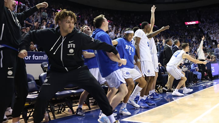 Feb 20, 2024; Provo, Utah, USA; The Brigham Young Cougars bench reacts to a shot against the Baylor