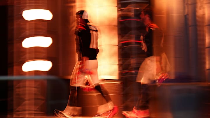 Cincinnati Bengals punter Kevin Huber (10) and long snapper Cal Adomitis (48) walk through the
