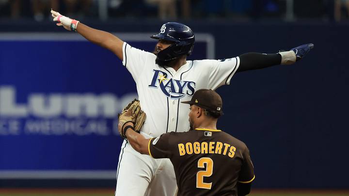 Aug 30, 2026; St. Petersburg, Florida, USA; San Diego Padres shortstop Xander Bogaerts (2) tags out Tampa Bay Rays third baseman Junior Caminero (13) as he attempted to steal during the sixth inning at Tropicana Field. Mandatory Credit: Kim Klement Neitzel-Imagn Images Aug 30, 2026; St. Petersburg, Florida, USA; San Diego Padres shortstop Xander Bogaerts (2) tags out Tampa Bay Rays third baseman Junior Caminero (13) as he attempted to steal during the sixth inning at Tropicana Field. Mandatory Credit: Kim Klement Neitzel-Imagn Images