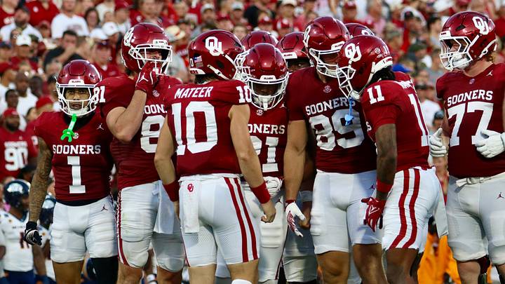 Oklahoma quarterback John Mateer talks to his team in the huddle against UTEP. Oklahoma quarterback John Mateer talks to his team in the huddle against UTEP.