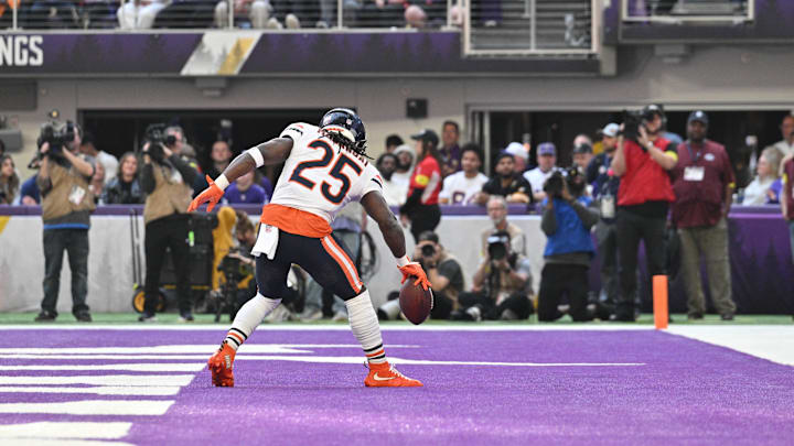 Nov 16, 2025; Minneapolis, Minnesota, USA; Chicago Bears running back Kyle Monangai (25) celebrates a touchdown during the first quarter against the Minnesota Vikings at U.S. Bank Stadium. Mandatory Credit: Jeffrey Becker-Imagn Images
