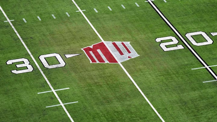 The Mountain West conference logo on the field at Allegiant Stadium. Mandatory Credit: Kirby Lee-Imagn Images The Mountain West conference logo on the field at Allegiant Stadium. Mandatory Credit: Kirby Lee-Imagn Images