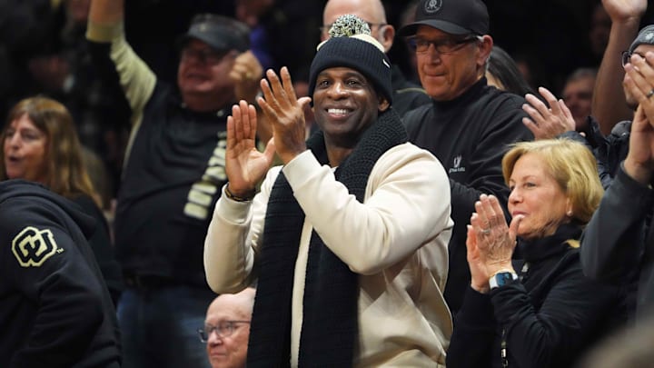 Jan 13, 2024; Boulder, Colorado, USA; Colorado Buffaloes football head coach Deion Sanders cheers in