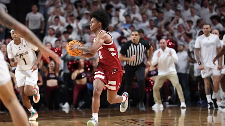 Alabama guard Aden Holloway (2) passes the ball against Texas A&M at Reed Arena in College Station, TX on Saturday, Jan 11, 2025.