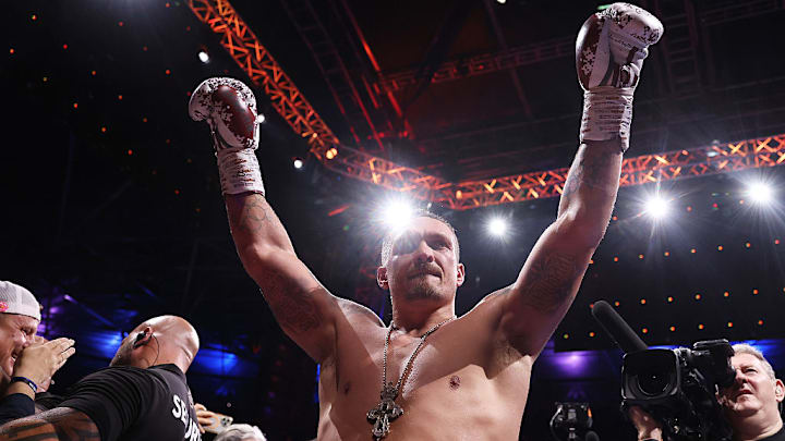 Heavyweight champion Oleksandr Usyk celebrates after defeating Daniel Dubois with a fifth-round knockout on July 19.