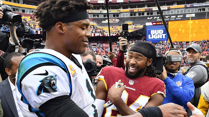 Oct 14, 2018; Landover, MD, USA; Washington Redskins cornerback Josh Norman (24) talks with Carolina Panthers quarterback Cam Newton (1) after their game at FedEx Field. Oct 14, 2018; Landover, MD, USA; Washington Redskins cornerback Josh Norman (24) talks with Carolina Panthers quarterback Cam Newton (1) after their game at FedEx Field.