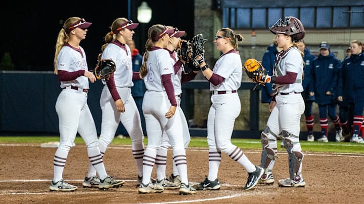 Hokies infield meets pitcher Emma Lemley at the mound after the win against No.24 Liberty. Hokies infield meets pitcher Emma Lemley at the mound after the win against No.24 Liberty.
