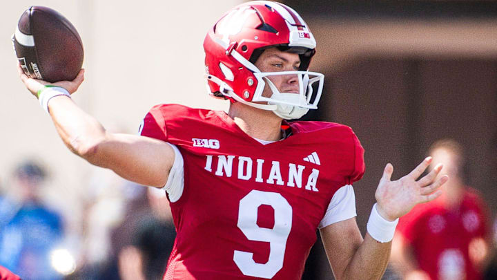 Indiana's Kurtis Rourke (9) passes against Charlotte at Memorial Stadium.