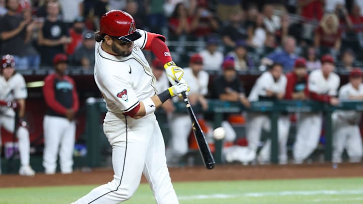 Arizona Diamondbacks third base Eugenio Suarez (28) connects with a pitch to walk off the Milwaukee Brewers on Sept. 15, 2024 at Chase Field in Phoenix. Arizona Diamondbacks third base Eugenio Suarez (28) connects with a pitch to walk off the Milwaukee Brewers on Sept. 15, 2024 at Chase Field in Phoenix.