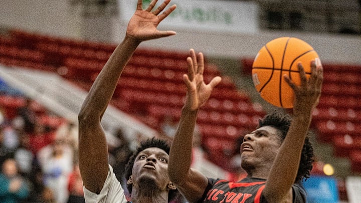 Victory Christian (10) Quinton Wilson goes up for the shot over North Tampa Christian (14) Toni Bryant during the FHSAA 1A state semi-final game at the RP Funding Center Tuesday, February 25, 2025, in Lakeland, FL. Victory won 65-63 in 4 overtime periods. Ernst Peters/The Ledger Victory Christian (10) Quinton Wilson goes up for the shot over North Tampa Christian (14) Toni Bryant during the FHSAA 1A state semi-final game at the RP Funding Center Tuesday, February 25, 2025, in Lakeland, FL. Victory won 65-63 in 4 overtime periods. Ernst Peters/The Ledger