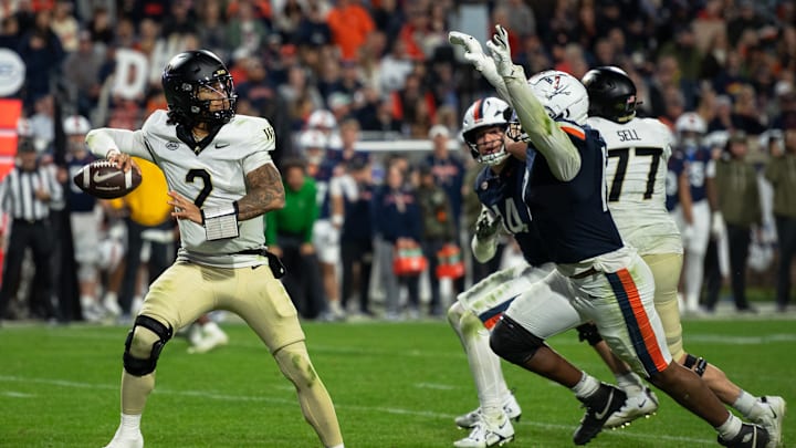 Wake Forest Quarterback Robby Ashford attempts a pass during the game against Virginia. 