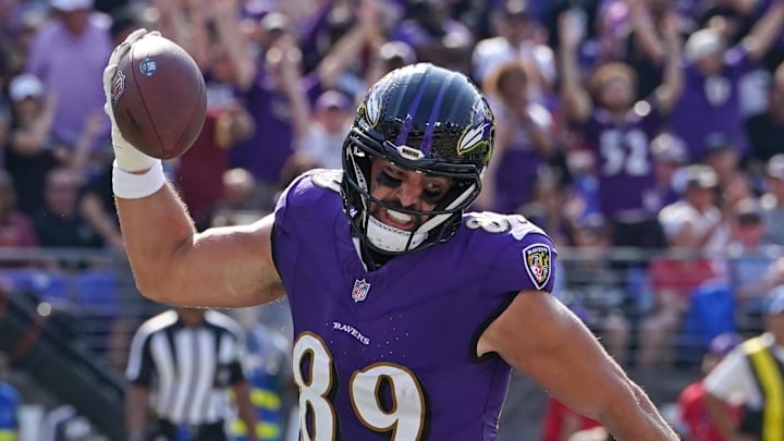 Oct 13, 2024; Baltimore, Maryland, USA; Baltimore Ravens tight end Mark Andrews (89) reacts following his touchdown catch during the second quarter against the Washington Commanders at M&T Bank Stadium. Mandatory Credit: Mitch Stringer-Imagn Images