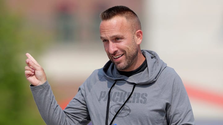 Green Bay Packers defensive coordinator Jeff Hafley interacts with fans before the start of practice on July 25, 2025, in Green Bay, Wis.