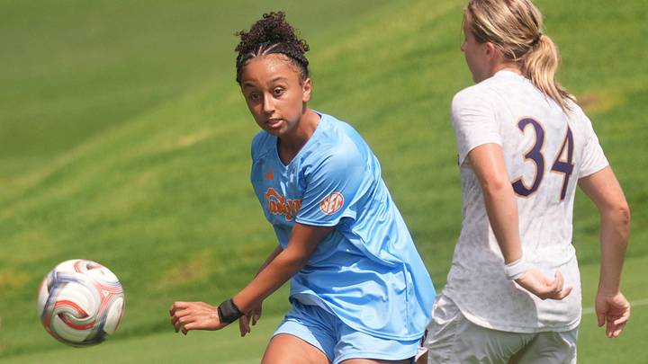 Tennessee's Nyla Blue (33) advances the ball while defended by Northwestern's Ava Goodin (34) during an NCAA college soccer match on Sept. 6, 2026, in Knoxville, Tennessee.