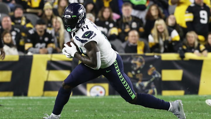 Oct 17, 2021; Pittsburgh, Pennsylvania, USA;  Seattle Seahawks wide receiver DK Metcalf (14) runs after a catch against the Pittsburgh Steelers during the second quarter at Heinz Field. Mandatory Credit: Charles LeClaire-Imagn Images