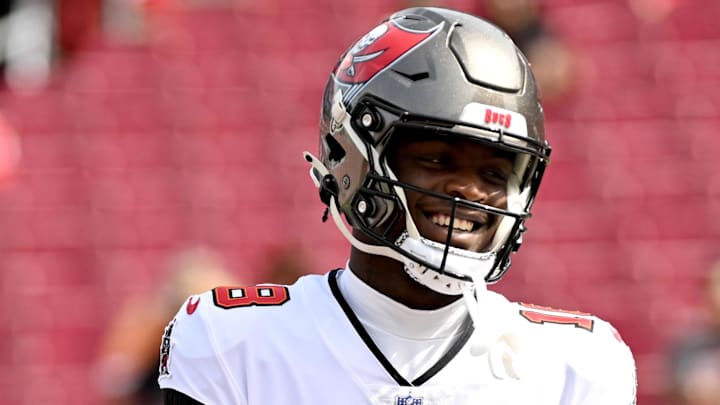 Oct 22, 2023; Tampa, Florida, USA; Tampa Bay Buccaneers wide receiver Rakim Jarrett (18) warms up before the start of the game against the Atlanta Falcons at Raymond James Stadium. Mandatory Credit: Jonathan Dyer-Imagn Images