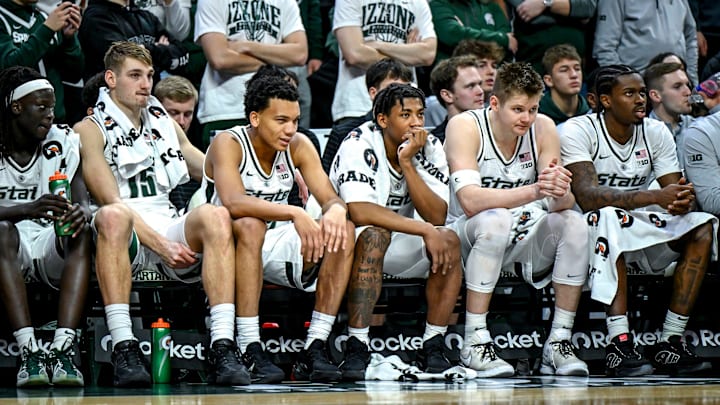 From left, Michigan State's Kur Teng, Carson Cooper, Divine Ugochukwu, Jeremy Fears Jr., Jaxon Kohler and Coen Carr looks on from the bench during the second half in the game against Maryland on Saturday, Jan. 24, 2026, at the Breslin Center in East Lansing.