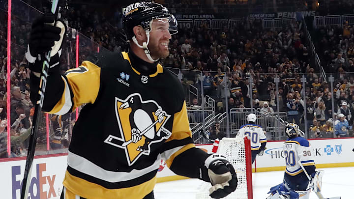 Dec 30, 2023; Pittsburgh, Pennsylvania, USA;  Pittsburgh Penguins center Jeff Carter (77) reacts