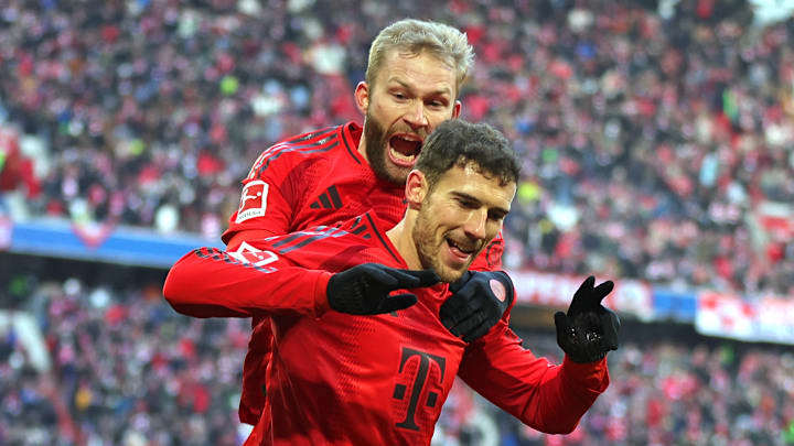 Leon Goretzka and Konrad Laimer celebrating a goal during Bayern Munich's win against Woflsburg.