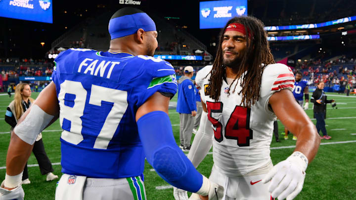 Oct 10, 2024; Seattle, Washington, USA; Seattle Seahawks tight end Noah Fant (87) and San Francisco 49ers linebacker Fred Warner (54) after the game at Lumen Field. 