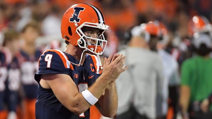 Sep 13, 2025; Champaign, Illinois, USA;  Illinois Fighting Illini quarterback Luke Altmyer (9) applauds teammates during the second half against the Western Michigan Broncos at Memorial Stadium. Mandatory Credit: Ron Johnson-Imagn Images