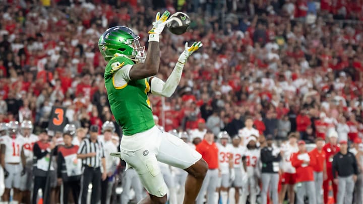 Oregon wide receiver Traeshon Holden catches a touchdown pass as the Oregon Ducks face the Ohio State Buckeyes Wednesday, Jan. 1, 2025, in the quarterfinal of the College Football Playoff at the Rose Bowl in Pasadena, Calif.