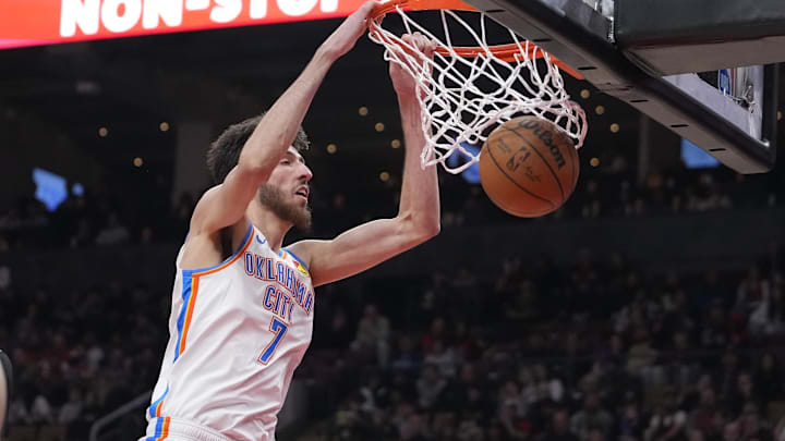 Mar 22, 2024; Toronto, Ontario, CAN; Oklahoma City Thunder forward Chet Holmgren (7) dunks a ball against the Toronto Raptors during the first half at Scotiabank Arena. Mandatory Credit: John E. Sokolowski-Imagn Images