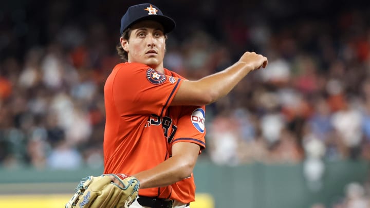 Jun 21, 2024; Houston, Texas, USA; Houston Astros starting pitcher Jake Bloss (39) stretches before pitching against the Baltimore Orioles in the second inning at Minute Maid Park