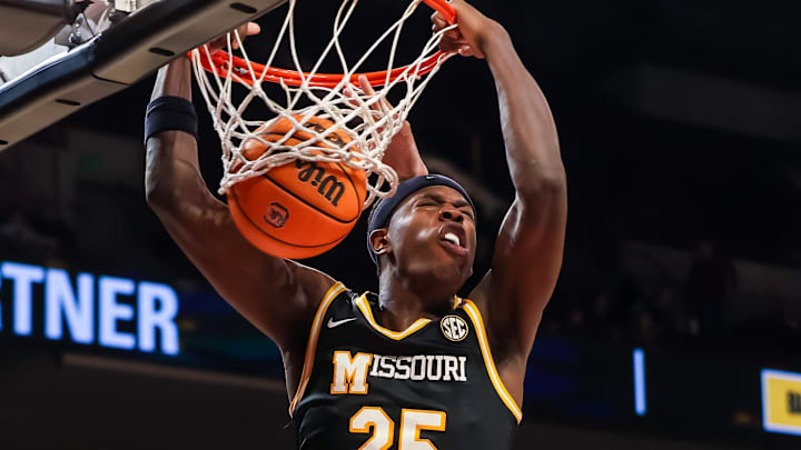 Feb 7, 2026; Columbia, South Carolina, USA; Missouri Tigers forward Mark Mitchell (25) dunks against the South Carolina Gamecocks in the second half at Colonial Life Arena. Mandatory Credit: Jeff Blake-Imagn Images