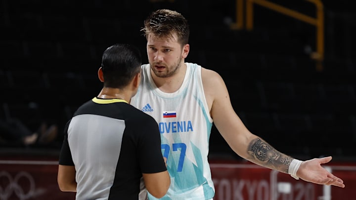 Aug 7, 2021; Saitama, Japan; Team Slovenia point guard Luka Doncic (77) questions a call after a technical foul in the second quarter against Australia during the Tokyo 2020 Olympic Summer Games at Saitama Super Arena. Mandatory Credit: Geoff Burke-Imagn Images Aug 7, 2021; Saitama, Japan; Team Slovenia point guard Luka Doncic (77) questions a call after a technical foul in the second quarter against Australia during the Tokyo 2020 Olympic Summer Games at Saitama Super Arena. Mandatory Credit: Geoff Burke-Imagn Images