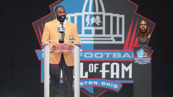 Hall of Fame Enshrinee Darrelle Revis smiles at the crowd during his speech while being inducted into the Pro Football Hall of Fame Saturday afternoon at Tom Benson Hall of Fame Stadium in Canton, Ohio. Hall of Fame Enshrinee Darrelle Revis smiles at the crowd during his speech while being inducted into the Pro Football Hall of Fame Saturday afternoon at Tom Benson Hall of Fame Stadium in Canton, Ohio.
