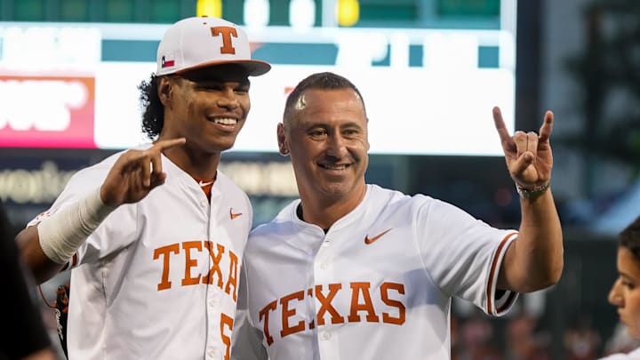 Texas Longhorns head football coach Steve Sarkisian takes a photo with pitcher Jonah Williams (55) ahead of the Lone Star Showdown against Texas A&M at UFCU Disch-Falk Field on Friday, April 25, 2025.