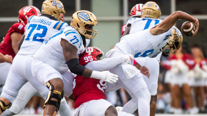 Indiana's Tyrique Tucker (95) sacks UCLA's Nico Iamaleava (9) during the Indiana versus UCLA football game at Memorial Stadium on Saturday, Oct. 25, 2025.
