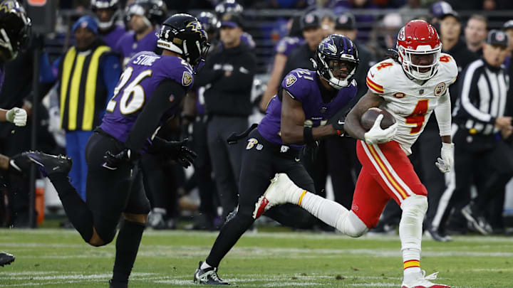 Jan 28, 2024; Baltimore, Maryland, USA; Kansas City Chiefs wide receiver Rashee Rice (4) runs with the ball after making a catch as Baltimore Ravens safety Geno Stone (26) and Ravens cornerback Brandon Stephens (21) chase in the AFC Championship football game at M&T Bank Stadium. Mandatory Credit: Geoff Burke-Imagn Images Jan 28, 2024; Baltimore, Maryland, USA; Kansas City Chiefs wide receiver Rashee Rice (4) runs with the ball after making a catch as Baltimore Ravens safety Geno Stone (26) and Ravens cornerback Brandon Stephens (21) chase in the AFC Championship football game at M&T Bank Stadium. Mandatory Credit: Geoff Burke-Imagn Images