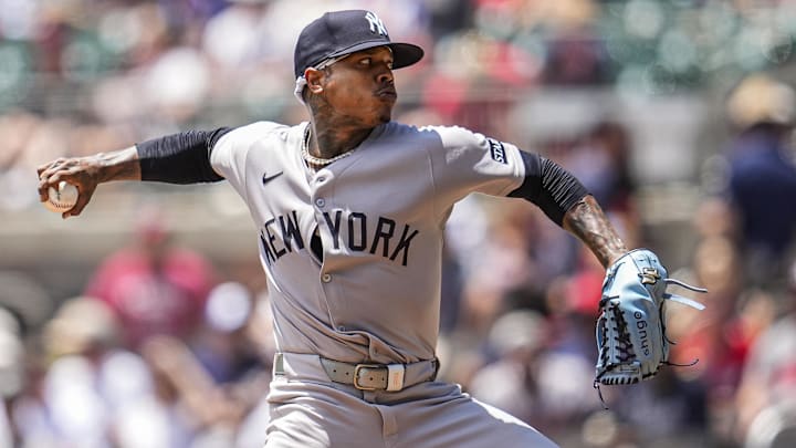 Jul 20, 2025; Cumberland, Georgia, USA; New York Yankees starting pitcher Marcus Stroman (0) pitches against the Atlanta Braves during the first inning at Truist Park. Mandatory Credit: Dale Zanine-Imagn Images