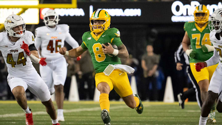 Oregon quarterback Dillon Gabriel carries the ball as the Oregon Ducks host the Maryland Terrapins at Autzen Stadium Saturday, Nov. 9, 2024 in Eugene, Ore.