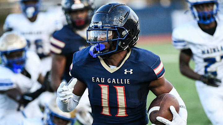 Xavier Lherisse of Eau Galliereturns a Mainland punt during their Kickoff Classic game Friday, August 16, 2024.Craig Bailey/FLORIDA TODAY via USA TODAY NETWORK