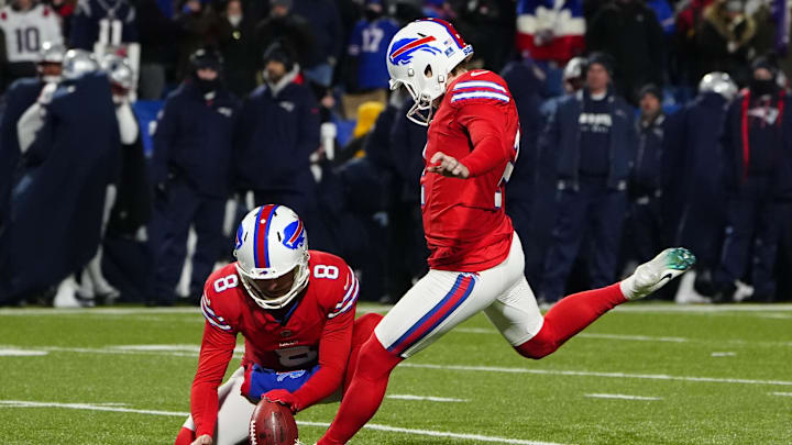 Dec 22, 2024; Orchard Park, New York, USA; Buffalo Bills place kicker Tyler Bass (2) kicks an extra point against the New England Patriots during the second half at Highmark Stadium. Mandatory Credit: Gregory Fisher-Imagn Images