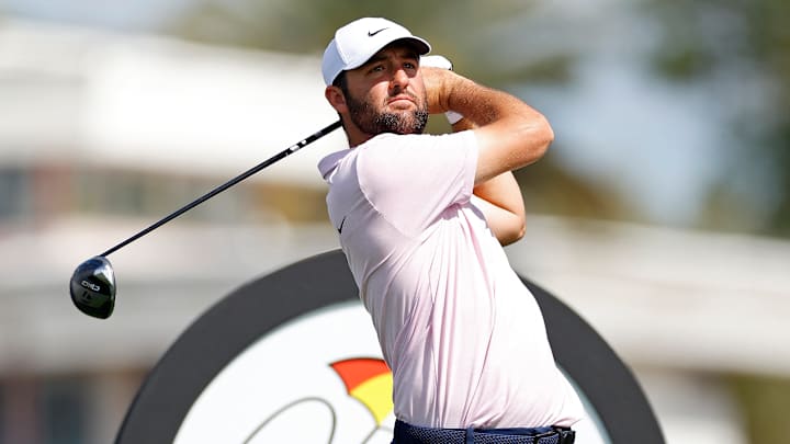 Scottie Scheffler tees off during a practice round ahead of the 2025 Arnold Palmer Invitational at Bay Hill Club & Lodge