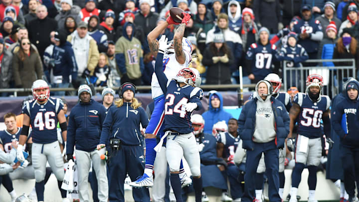 Dec 24, 2017; Foxborough, MA, USA; Buffalo Bills wide receiver Kelvin Benjamin (13) catches a pass over New England Patriots cornerback Stephon Gilmore (24) during the second half at Gillette Stadium. 
