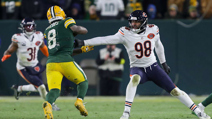 Chicago Bears defensive end Montez Sweat (98) misses a tackle on Green Bay Packers running back Josh Jacobs (8) on Sunday, December 7, 2025, at Lambeau Field in Green Bay, Wis. The Packers won the game, 28-21.
Tork Mason/USA TODAY NETWORK-Wisconsin