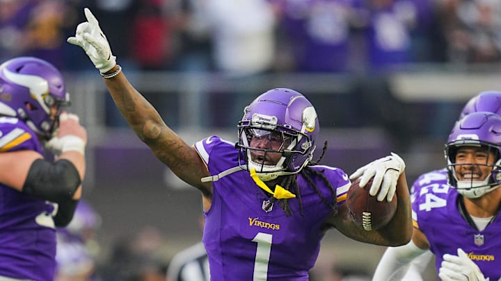 Dec 1, 2024; Minneapolis, Minnesota, USA; Minnesota Vikings cornerback Shaquill Griffin (1) celebrates his interception against the Arizona Cardinals in the fourth quarter at U.S. Bank Stadium. Mandatory Credit: Brad Rempel-Imagn Images