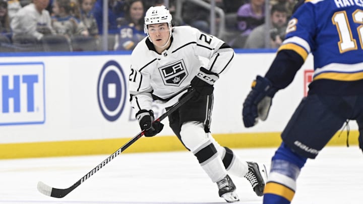 Jan 28, 2024; St. Louis, Missouri, USA; Los Angeles Kings defenseman Jordan Spence (21) skates against the St. Louis Blues during the first period at Enterprise Center. Mandatory Credit: Jeff Le-Imagn Images