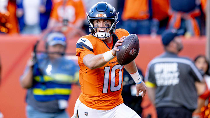 DENVER, CO - OCTOBER 19: Bo Nix scores a touchdown vs. the New York Giants.