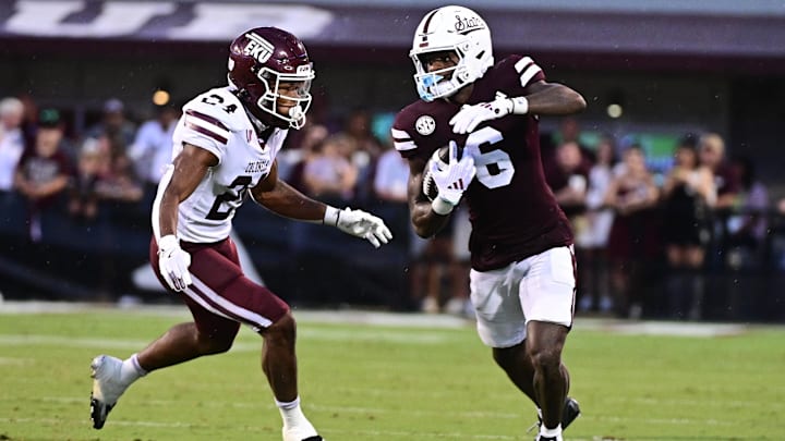 Aug 31, 2024; Starkville, Mississippi, USA; Mississippi State Bulldogs wide receiver Jordan Mosley (6) runs the ball while defended by Eastern Kentucky Colonels defensive back Sam Robertson (24) during the third quarter at Davis Wade Stadium at Scott Field. Mandatory Credit: Matt Bush-USA TODAY Sports