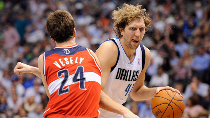 Mar 13, 2012; Dallas, TX, USA; Dallas Mavericks power forward Dirk Nowitzki (41) drives the ball past Washington Wizards forward Jan Vesely (24) during the second quarter at the American Airlines Center. Mandatory Credit: Jerome Miron-Imagn Images